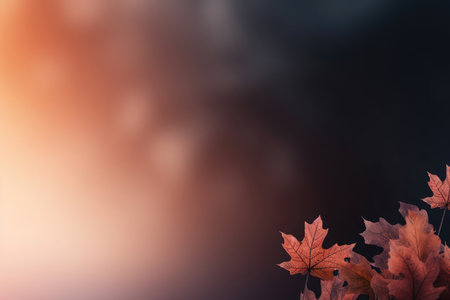 Autumn background. Branch of red and pink leaves on a bush on a blurred pink and red background. Beautiful vibrant blurred bokeh for autumn designの素材