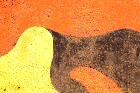 Color rusty abstract painted metal plate texture and background. Yellow, black and orange texture of grunge old plate with stained cracked paint and brown rust.の写真素材