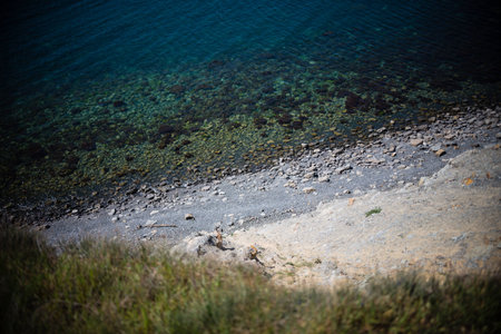 sea view from the cliff with rocky beachの写真素材