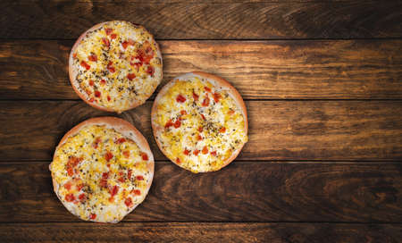 Fresh pizza with vegetables out from the ovenの写真素材