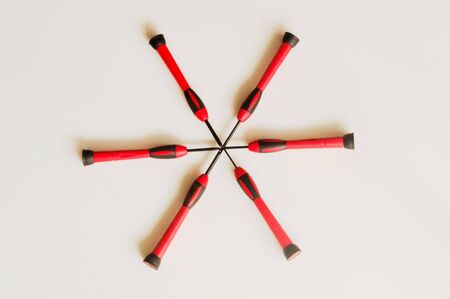 Red and black screw driver in a red box