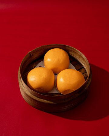 Bapao salted egg processed by bamboo steamerの写真素材