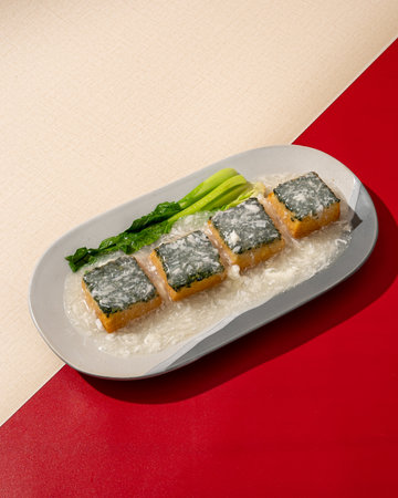 Vegetable tofu drizzled with egg sauceの写真素材
