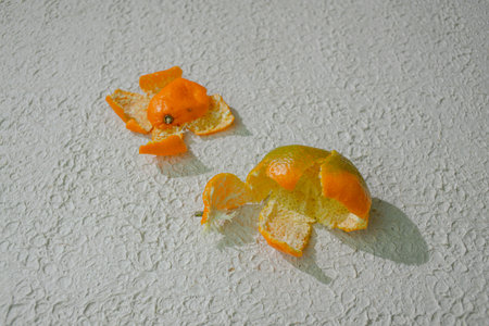 Peeled mandarin orange or tangerine isolated on white background with clipping pathの写真素材