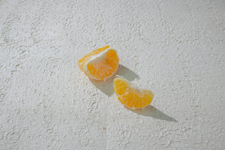 Fresh peeled mandarin orange or tangerine isolated on white background with clipping path