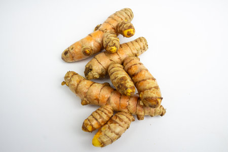 Turmeric is a typical Indonesian spice that is yellow in color. in Groups. typical Indonesian. isolated on white background.の写真素材