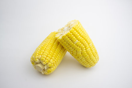 Cracked sweet corn. fresh corn. isolated on white background