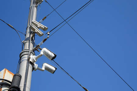outdoor surveillance camera on a poleの写真素材