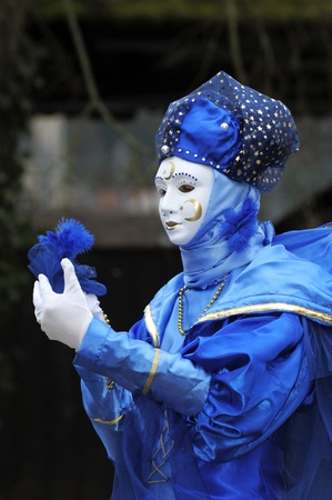 Venetian Carnival Mask - A portrait of one of the most beautiful masks photographed in open street during venetian carnival.の写真素材