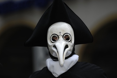 Venetian Carnival Mask - A portrait of one of the most beautiful masks photographed in open street during venetian carnival.の写真素材