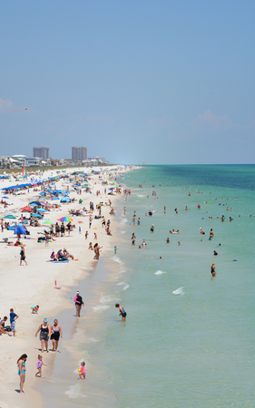 Beach goers at Pensacola Beach in Escambia County, Florida on the Gulf of Mexico, USAのeditorial素材