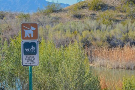 Keep Dogs on leash, please clean up after your pets sign. At Topock Marsh, Lake Havasu, Arizona USAの写真素材