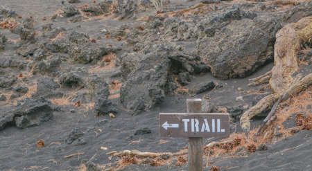 A Trail Sign at the base of Sunset Crater Volcano on Bonito Lava Flow in Arizona.