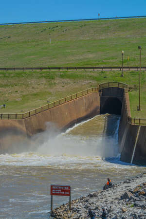 The Dammed Tallahatchie River feeds the spillway to feed the Sardis Reservoir in Sardis, Panola...