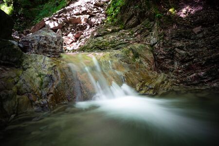 Mountain river in the forest. Cascades and waterfall in the mountains.の写真素材