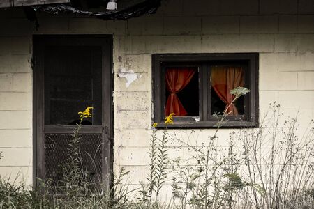 An old yet colorful abandoned house.の写真素材