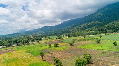 Aerial view of endless lush pastures and farmlands of morogoro town, Tanzaniaの写真素材