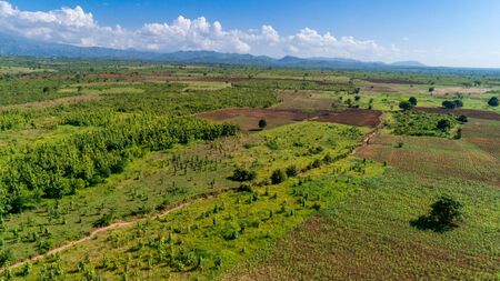 Aerial view of endless lush pastures and farmlands of morogoro town, Tanzaniaの写真素材