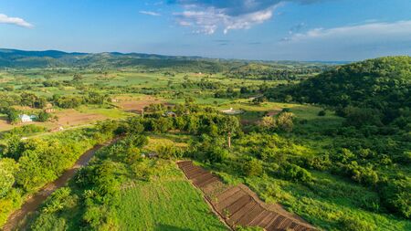 Aerial view of endless lush pastures and farmlands of morogoro town, Tanzaniaの写真素材