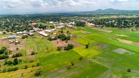 Aerial view of endless lush pastures and farmlands of morogoro town, Tanzaniaの写真素材