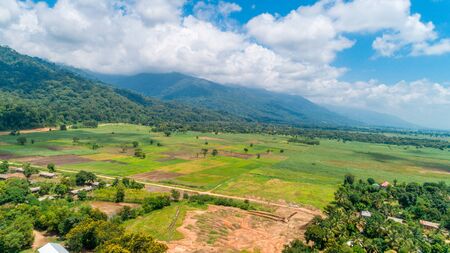 Aerial view of endless lush pastures and farmlands of morogoro town, Tanzaniaの写真素材