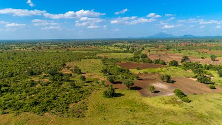 Aerial view of endless lush pastures and farmlands of morogoro town, Tanzaniaの写真素材
