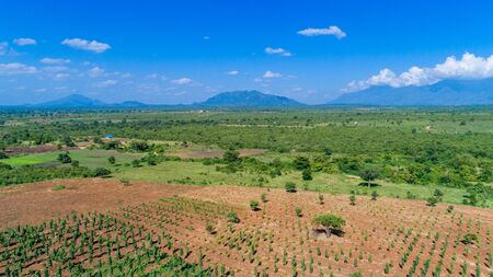 Aerial view of endless lush pastures and farmlands of morogoro town, Tanzaniaの写真素材