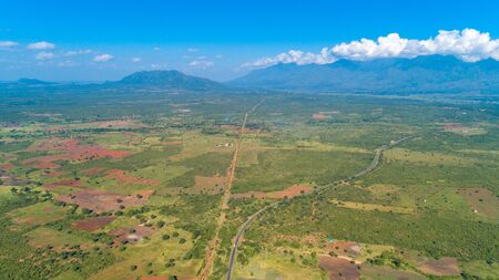 Aerial view of endless lush pastures and farmlands of morogoro town, Tanzaniaの写真素材