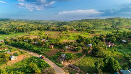 Aerial view of endless lush pastures and farmlands of morogoro town, Tanzaniaの写真素材