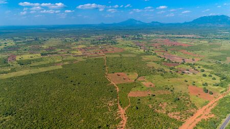 Aerial view of endless lush pastures and farmlands of morogoro town, Tanzaniaの写真素材