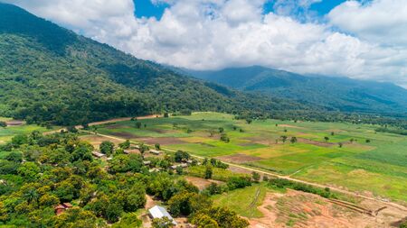 Aerial view of endless lush pastures and farmlands of morogoro town, Tanzaniaの写真素材