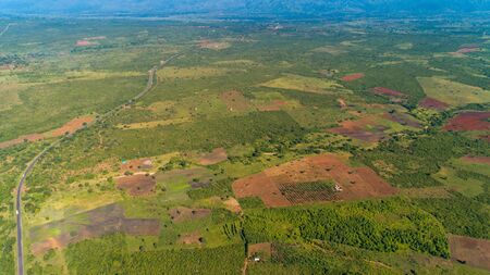 Aerial view of endless lush pastures and farmlands of morogoro town, Tanzaniaの写真素材