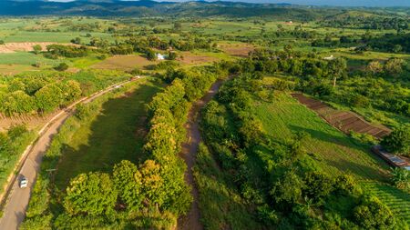 Aerial view of endless lush pastures and farmlands of morogoro town, Tanzaniaの写真素材