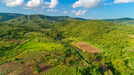 Aerial view of endless lush pastures and farmlands of morogoro town, Tanzaniaの写真素材