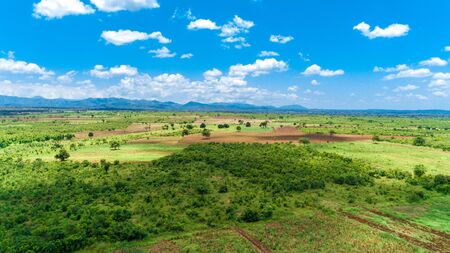 Aerial view of endless lush pastures and farmlands of morogoro town, Tanzaniaの写真素材