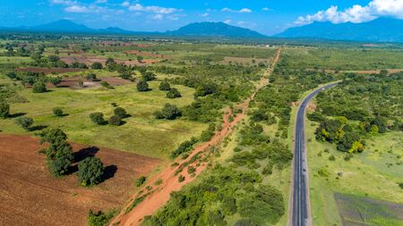Aerial view of endless lush pastures and farmlands of morogoro town, Tanzaniaの写真素材