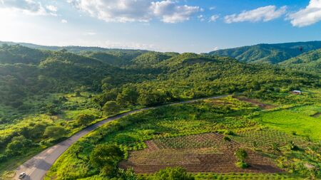 Aerial view of endless lush pastures and farmlands of morogoro town, Tanzaniaの写真素材