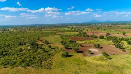 Aerial view of endless lush pastures and farmlands of morogoro town, Tanzaniaの写真素材