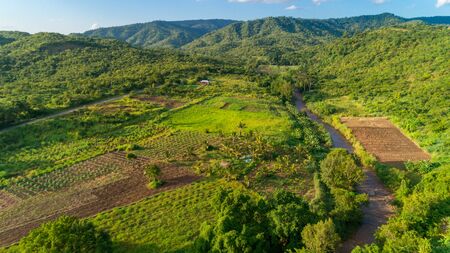 Aerial view of endless lush pastures and farmlands of morogoro town, Tanzaniaの写真素材