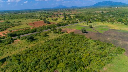 Aerial view of endless lush pastures and farmlands of morogoro town, Tanzaniaの写真素材