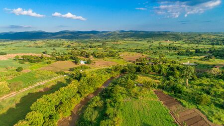 Aerial view of endless lush pastures and farmlands of morogoro town, Tanzaniaの写真素材