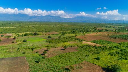 Aerial view of endless lush pastures and farmlands of morogoro town, Tanzaniaの写真素材