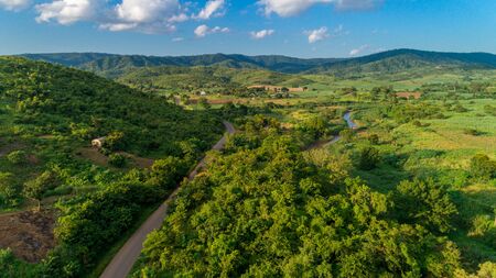 Aerial view of endless lush pastures and farmlands of morogoro town, Tanzaniaの写真素材