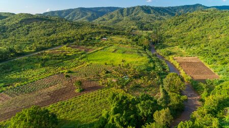 Aerial view of endless lush pastures and farmlands of morogoro town, Tanzaniaの写真素材