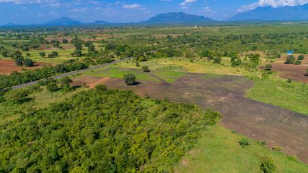 Aerial view of endless lush pastures and farmlands of morogoro town, Tanzaniaの写真素材