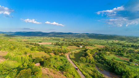 Aerial view of endless lush pastures and farmlands of morogoro town, Tanzaniaの写真素材