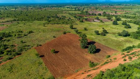 Aerial view of endless lush pastures and farmlands of morogoro town, Tanzaniaの写真素材
