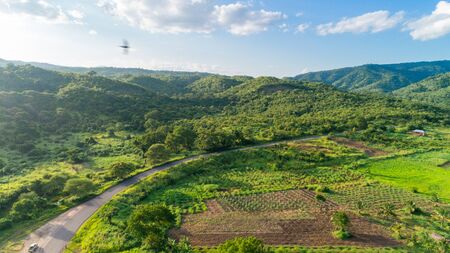 Aerial view of endless lush pastures and farmlands of morogoro town, Tanzaniaの写真素材