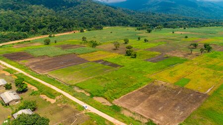 Aerial view of endless lush pastures and farmlands of morogoro town, Tanzaniaの写真素材