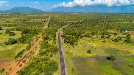 Aerial view of endless lush pastures and farmlands of morogoro town, Tanzaniaの写真素材